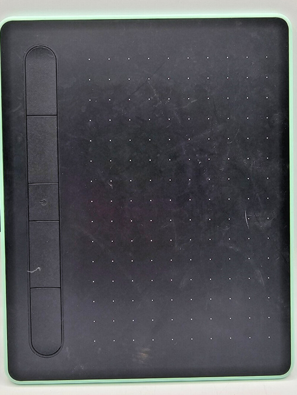 Wacom Intuos Small graphics tablet in a black finish with a pistachio green
